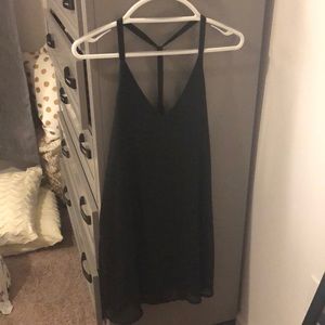 Shimmery black stress with t straps